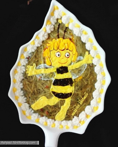 عکس تزئین آش رشته به شکل هاچ زنبور عسل برای پذیرایی از مهمان تم تولد زنبوری زرد