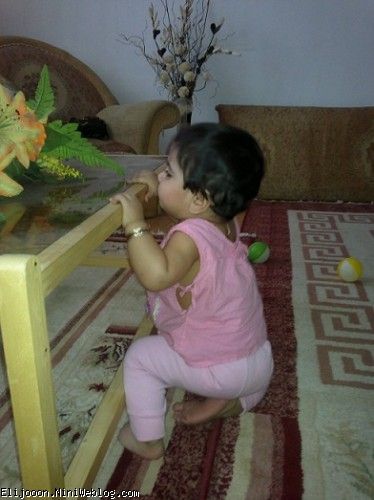 الی 