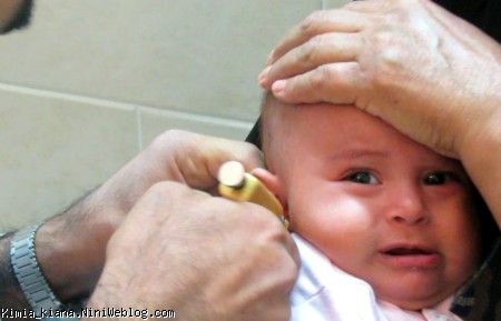 سوراخ کردن گوش دو قلوها