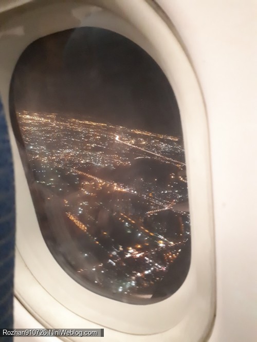 عکس از پنجره هواپیما در شب تهران